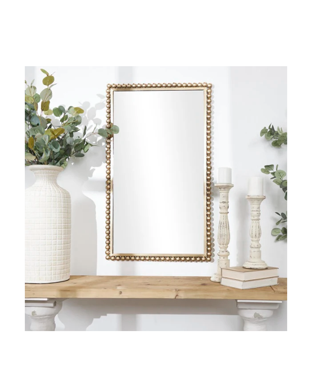 OSMOPOLITAN GOLD METAL WALL MIRROR WITH BEADED DETAILING
